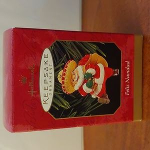 Hallmark 1999 Feliz Navidad Santa Ornament